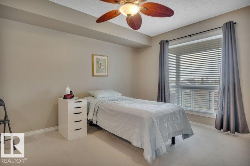 302 102A Bridgeport Crossing, Leduc, AB - Indoor Photo Showing Bedroom