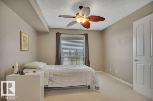 302 102A Bridgeport Crossing, Leduc, AB - Indoor Photo Showing Bedroom
