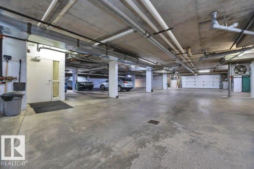 302 102A Bridgeport Crossing, Leduc, AB - Indoor Photo Showing Garage