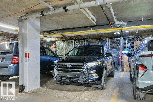 302 102A Bridgeport Crossing, Leduc, AB - Indoor Photo Showing Garage