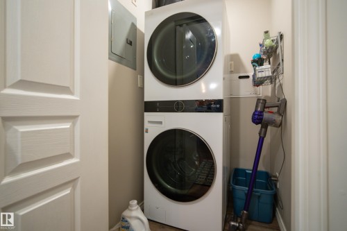 440 2436 Guardian Road, Edmonton, AB - Indoor Photo Showing Laundry Room