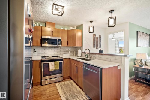 440 2436 Guardian Road, Edmonton, AB - Indoor Photo Showing Kitchen With Double Sink With Upgraded Kitchen