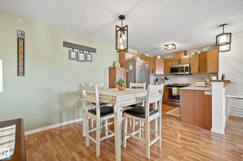 440 2436 Guardian Road, Edmonton, AB - Indoor Photo Showing Dining Room