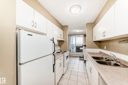 115 8735 165 Street, Edmonton, AB - Indoor Photo Showing Kitchen With Double Sink