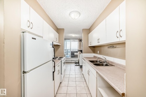 115 8735 165 Street, Edmonton, AB - Indoor Photo Showing Kitchen With Double Sink