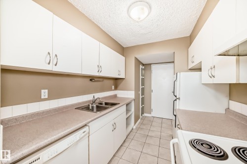 115 8735 165 Street, Edmonton, AB - Indoor Photo Showing Kitchen With Double Sink