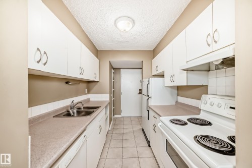 115 8735 165 Street, Edmonton, AB - Indoor Photo Showing Kitchen With Double Sink