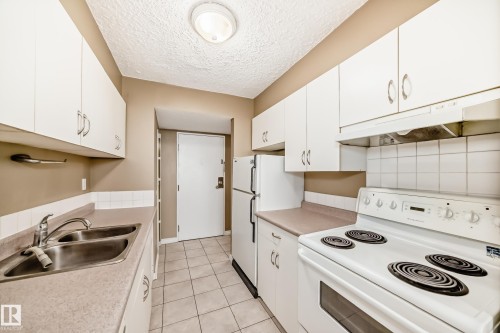 115 8735 165 Street, Edmonton, AB - Indoor Photo Showing Kitchen With Double Sink