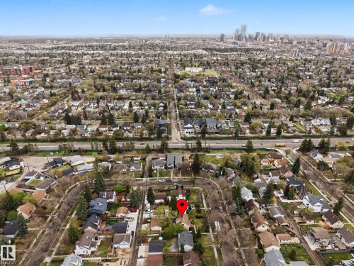 Aerial perspective showcasing a residential neighborhood with a distant urban skyline - 13316 109A Avenue, Edmonton, AB - Outdoor With View