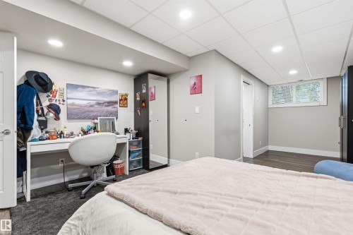 Interior room featuring light gray walls, recessed lighting, and a drop ceiling - 14608 97 Avenue, Edmonton, AB - Indoor Photo Showing Bedroom