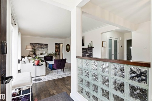 Entryway featuring a decorative glass block partition with a wood cap - 14608 97 Avenue, Edmonton, AB - Indoor Photo Showing Other Room