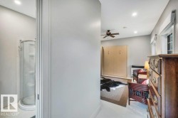 This guest accommodation is part of the garage and offers a 3 pce bath also. - 