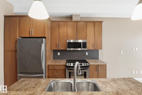 330 10531 117 Street, Edmonton, AB - Indoor Photo Showing Kitchen With Stainless Steel Kitchen With Double Sink