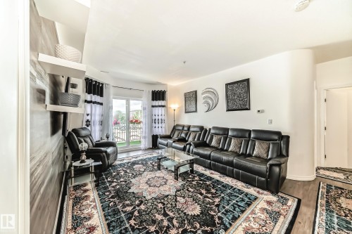 207 4316 139 Avenue, Edmonton, AB - Indoor Photo Showing Living Room