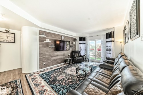 207 4316 139 Avenue, Edmonton, AB - Indoor Photo Showing Living Room