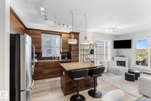 313 2590 Anderson Way, Edmonton, AB - Indoor With Fireplace