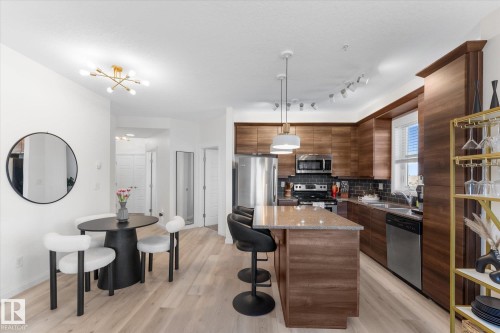313 2590 Anderson Way, Edmonton, AB - Indoor Photo Showing Kitchen With Stainless Steel Kitchen With Double Sink With Upgraded Kitchen