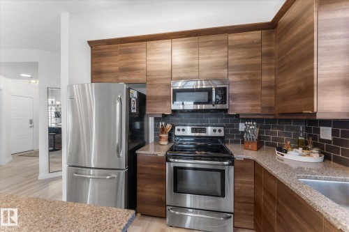 313 2590 Anderson Way, Edmonton, AB - Indoor Photo Showing Kitchen With Stainless Steel Kitchen With Upgraded Kitchen