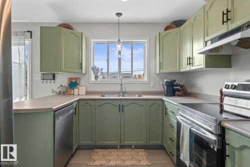 4813 50 Avenue, Cold Lake, AB - Indoor Photo Showing Kitchen With Double Sink