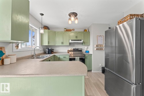 4813 50 Avenue, Cold Lake, AB - Indoor Photo Showing Kitchen With Double Sink