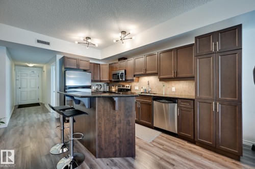 407 10303 111 Street, Edmonton, AB - Indoor Photo Showing Kitchen With Stainless Steel Kitchen