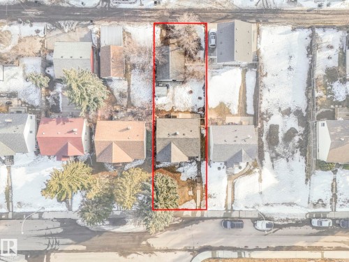 Aerial view of the property, featuring a residential structure and surrounding grounds - 10645 62 Avenue, Edmonton, AB - Outdoor With View