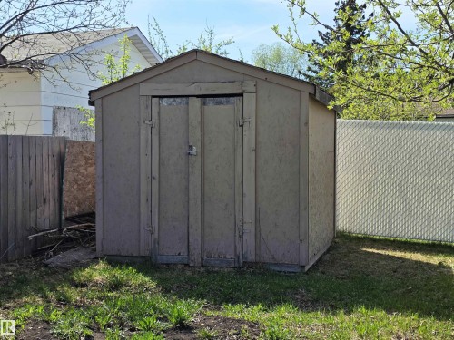 Outdoor storage shed with dual front doors and a sloped roof - 4029 55 Avenue, Drayton Valley, AB - Outdoor