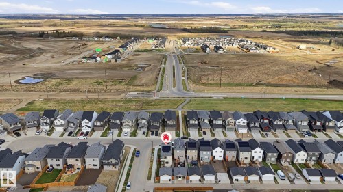 Aerial perspective showcasing a developing residential area with numerous modern homes - 17364 2 Street, Edmonton, AB - Outdoor With View