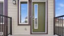 Entry door with vertical glass insert and smart lock - 17364 2 Street, Edmonton, AB  - Outdoor With Exterior 