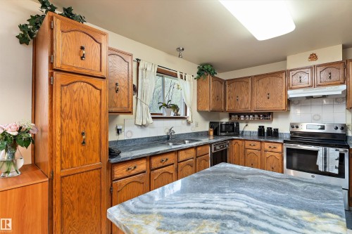 1863 104 Street, Edmonton, AB - Indoor Photo Showing Kitchen With Double Sink