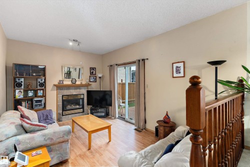 1863 104 Street, Edmonton, AB - Indoor Photo Showing Living Room With Fireplace