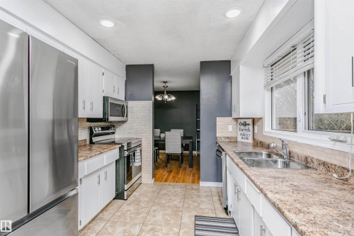 4708 45 Street, Gibbons, AB - Indoor Photo Showing Kitchen With Double Sink