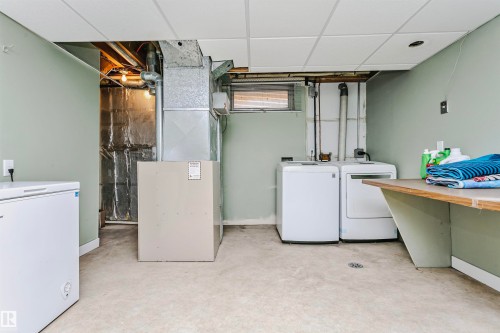 4708 45 Street, Gibbons, AB - Indoor Photo Showing Laundry Room