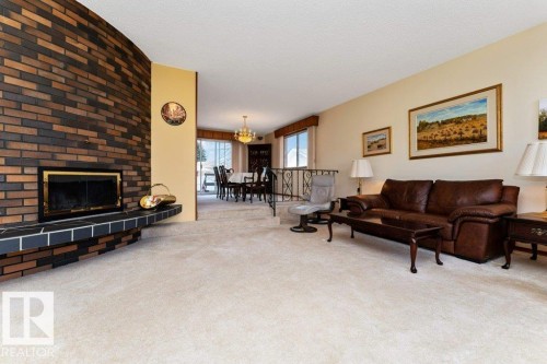 6719 31A Avenue, Edmonton, AB - Indoor Photo Showing Living Room With Fireplace