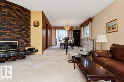 6719 31A Avenue, Edmonton, AB - Indoor Photo Showing Living Room With Fireplace