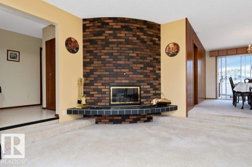 6719 31A Avenue, Edmonton, AB - Indoor Photo Showing Other Room With Fireplace