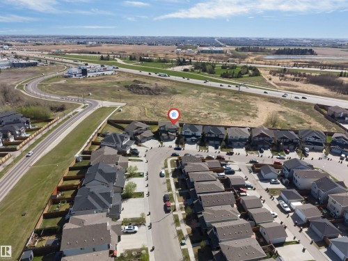 Aerial perspective showcasing a residential development with a consistent architectural style - 2292 Casey Crescent, Edmonton, AB - Outdoor With View