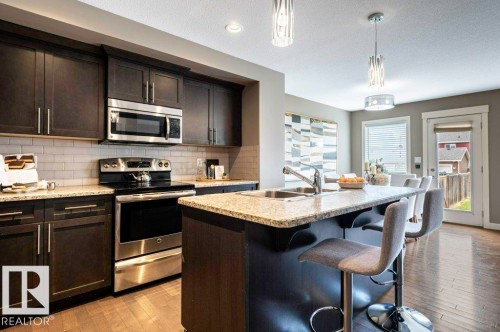471 Reed Crescent, Leduc, AB - Indoor Photo Showing Kitchen With Stainless Steel Kitchen With Double Sink With Upgraded Kitchen
