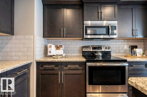 471 Reed Crescent, Leduc, AB - Indoor Photo Showing Kitchen With Stainless Steel Kitchen With Upgraded Kitchen