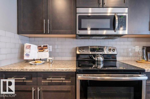 471 Reed Crescent, Leduc, AB - Indoor Photo Showing Kitchen With Upgraded Kitchen