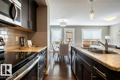 471 Reed Crescent, Leduc, AB - Indoor Photo Showing Kitchen With Double Sink With Upgraded Kitchen