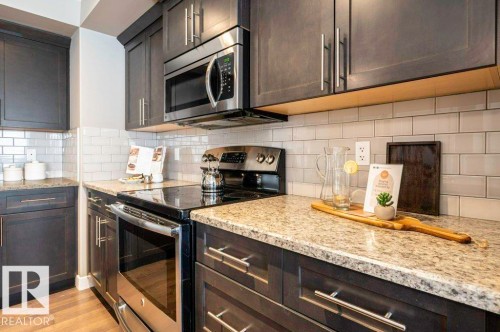 471 Reed Crescent, Leduc, AB - Indoor Photo Showing Kitchen With Stainless Steel Kitchen With Upgraded Kitchen
