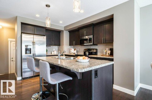 471 Reed Crescent, Leduc, AB - Indoor Photo Showing Kitchen With Double Sink With Upgraded Kitchen