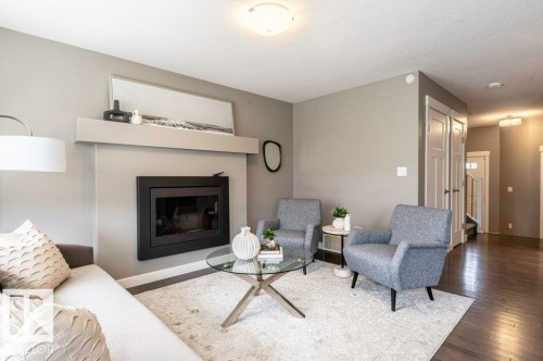 471 Reed Crescent, Leduc, AB - Indoor Photo Showing Living Room With Fireplace