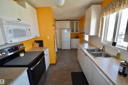 4126A 47 Avenue, St. Paul Town, AB - Indoor Photo Showing Kitchen With Double Sink