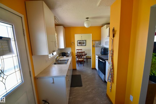 4126A 47 Avenue, St. Paul Town, AB - Indoor Photo Showing Kitchen With Double Sink