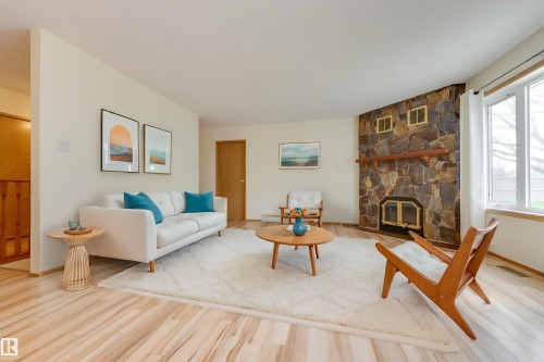 17310 Callingwood Road, Edmonton, AB - Indoor Photo Showing Living Room With Fireplace