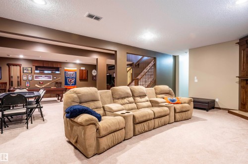 Spacious finished lower level with recessed lighting and neutral carpeting - 19 Newton Place, St. Albert, AB - Indoor