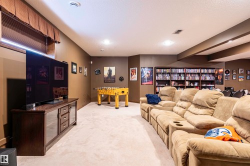 Spacious room featuring neutral wall tones and light-colored carpeting - 19 Newton Place, St. Albert, AB - Indoor