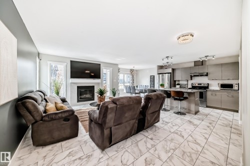 4404 6 Street, Edmonton, AB - Indoor Photo Showing Living Room With Fireplace